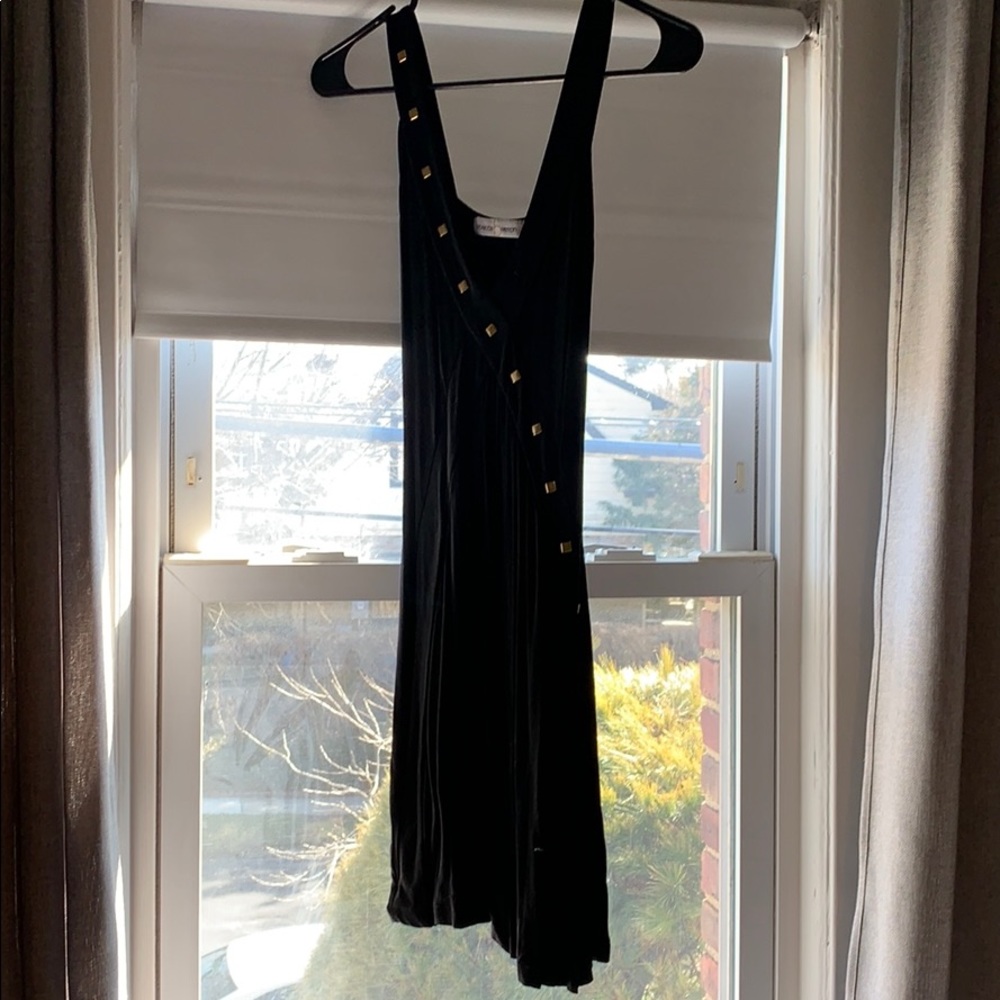 Black dress with gold metal hardware